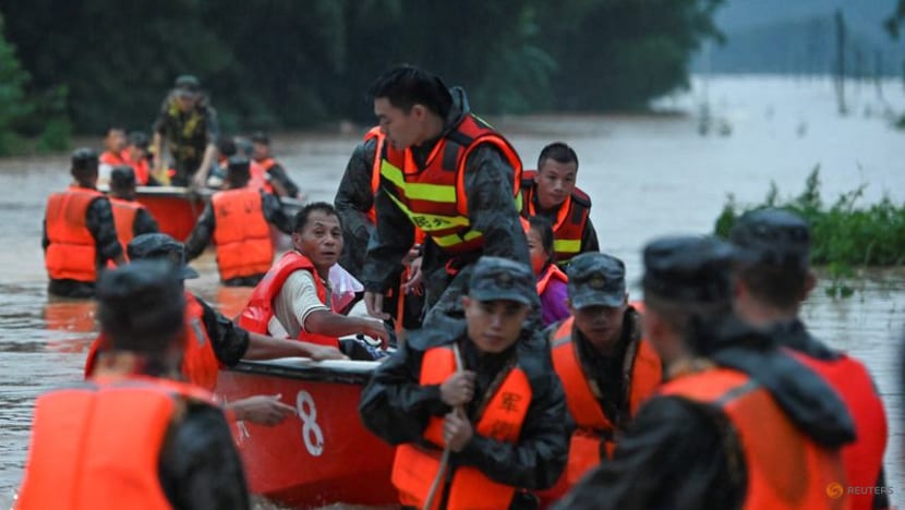 Rainstorms lash north-east China, trapping cars, buses in floods Rainstorms lash north-east China, trapping cars, buses in floods