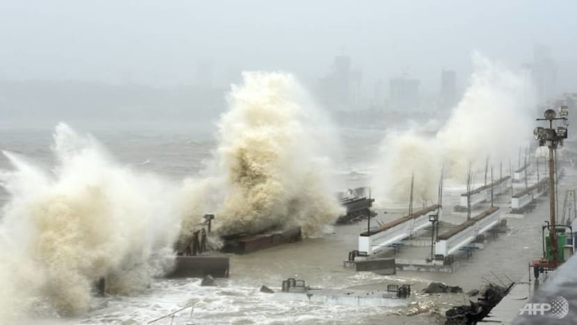 Indian navy hunts for 80 missing at sea after devastating cyclone