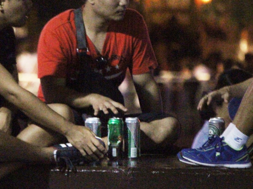 People consuming alcohol at Clarke Quay. Photo: Ernest Chua/TODAY