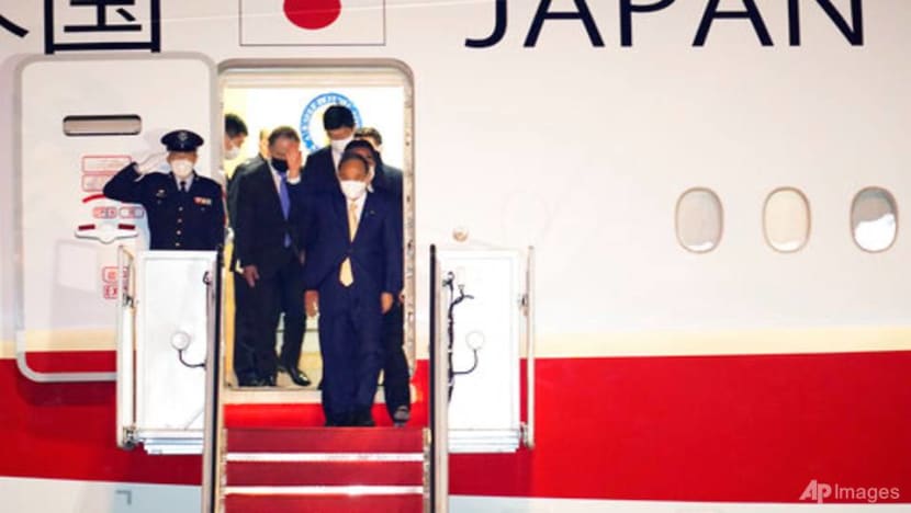 Japan PM Suga arrives in US for China-focused talks with Biden
