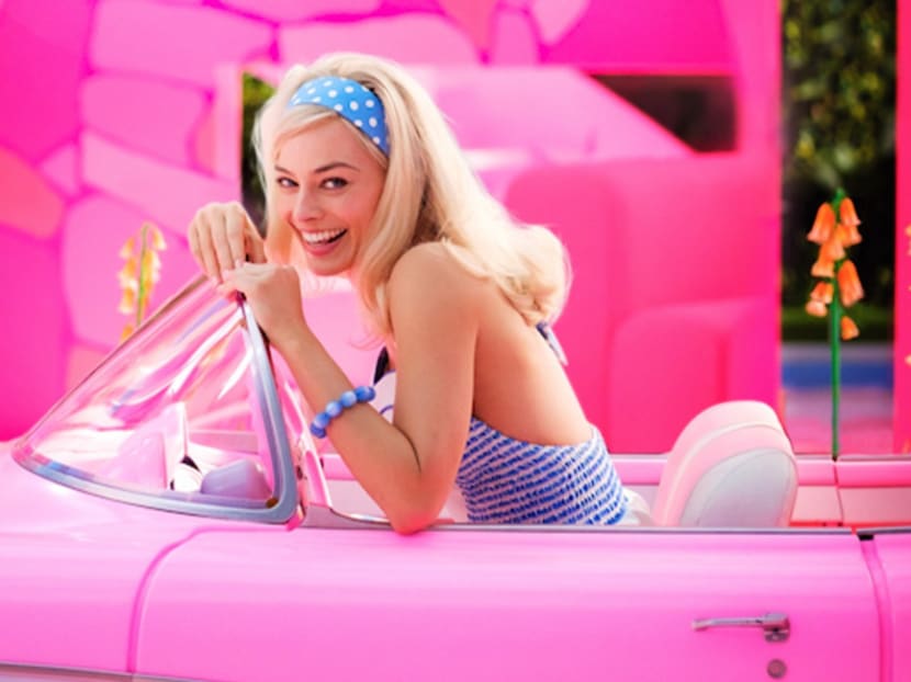 First Look: Margot Robbie As Barbie  Driving In Her Pink Car 