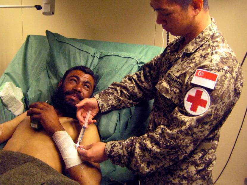 The SAF medical team administered aid in Afghanistan in 2009. It was recently announced that soldiers from the SAF’s Army Deployment Force would join a medical team in Iraq as part of its contribution towards global efforts to defeat IS. Photo: Mindef