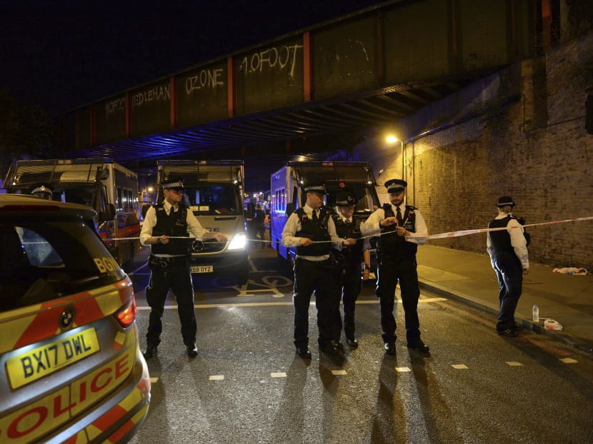 Police officers roping off an area at Finsbury Park in north London, where one person has been arrested after a vehicle struck pedestrians, leaving "a number of casualties". Photo: Victoria Jones/PA Wire