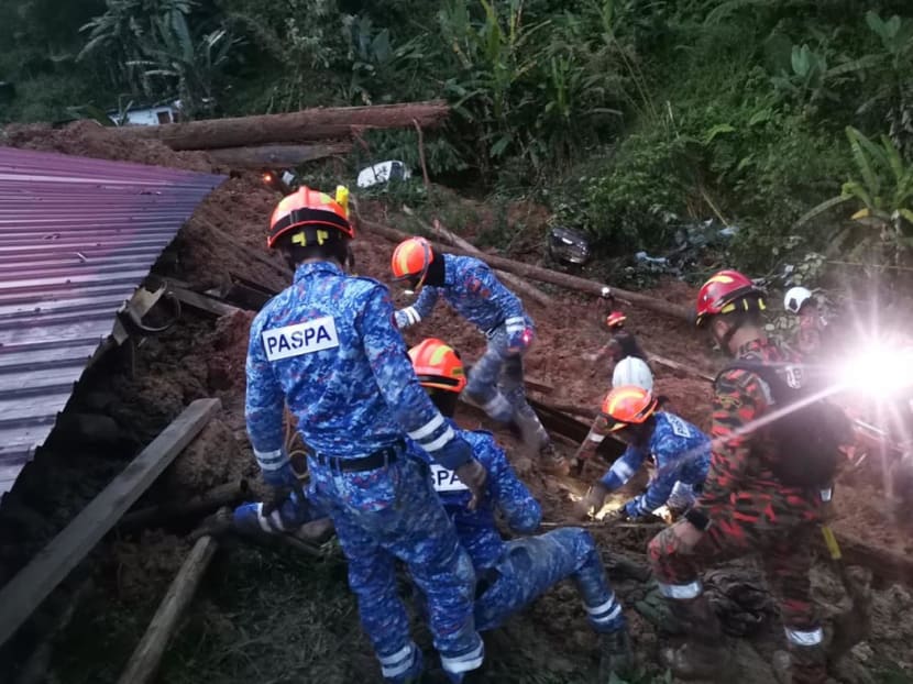 Rescue personnel at the campsite after a landslide in Batang Kali, Selangor on Dec 16, 2022.