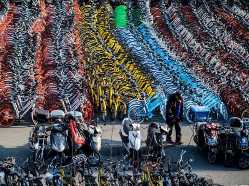 Bicycles from various bike-sharing schemes in China. AFP