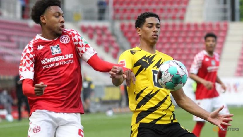 Football: Dortmund cruise past Mainz to book Champions League spot