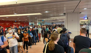 Delays at Changi Airport, land checkpoints caused by 'technical glitch' during system upgrade: ICA