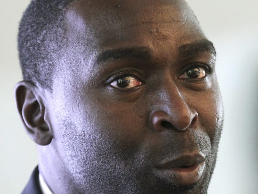 Former Manchester United and England striker Andy Cole attends a press conference on Monday, Nov 4, 2013, in Singapore where a Unilever and Manchester United Partnership was announced. Photo: AP