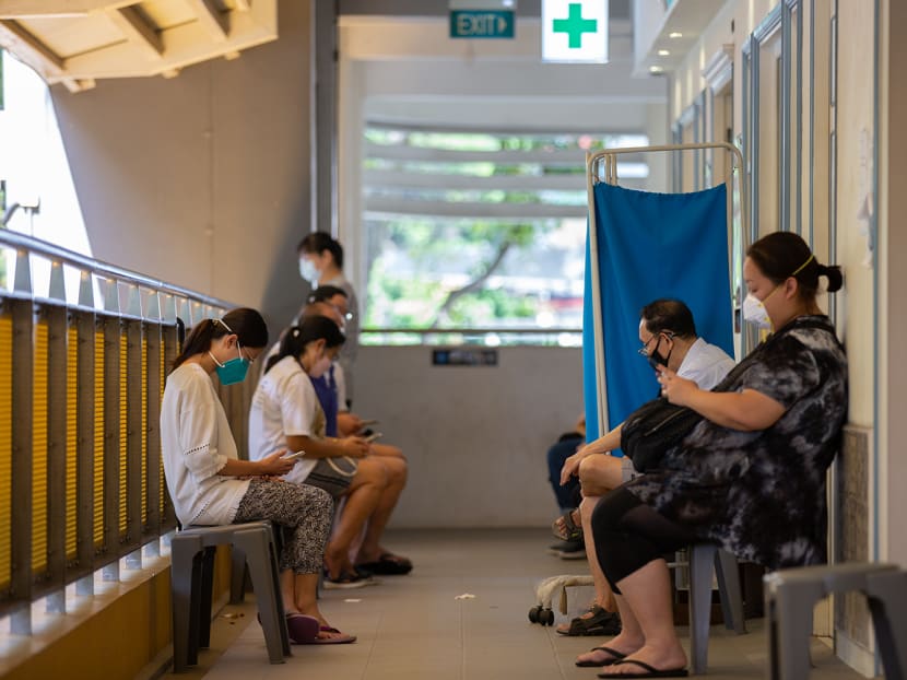 Patients are seen outside a clinic at Tiong Bahru on Feb 25, 2022. 