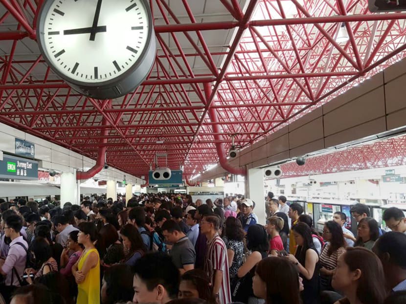 Crowds still thronged Jurong East MRT Station on the NS Line at around 9am on Nov 25, 2015, about an hour after train services had resumed. Photo: Corey Sta Maria