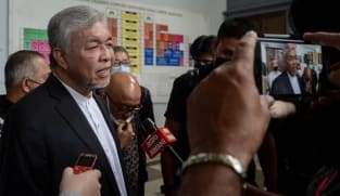 Malaysia court rejects UMNO president Ahmad Zahid’s bid to halt corruption trial proceedings