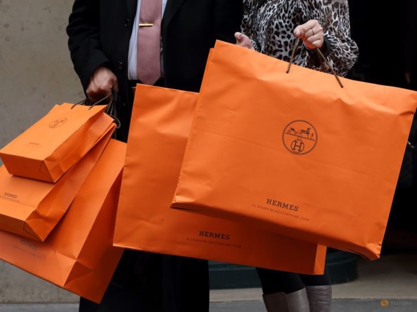 Affluent splash out on pricey Birkin bags but clouds loom