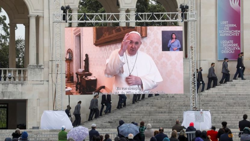 'Not free from COVID-19': Thousands pray at Portuguese shrine despite fears of new wave 'Not free from COVID-19': Thousands pray at Portuguese shrine despite fears of new wave