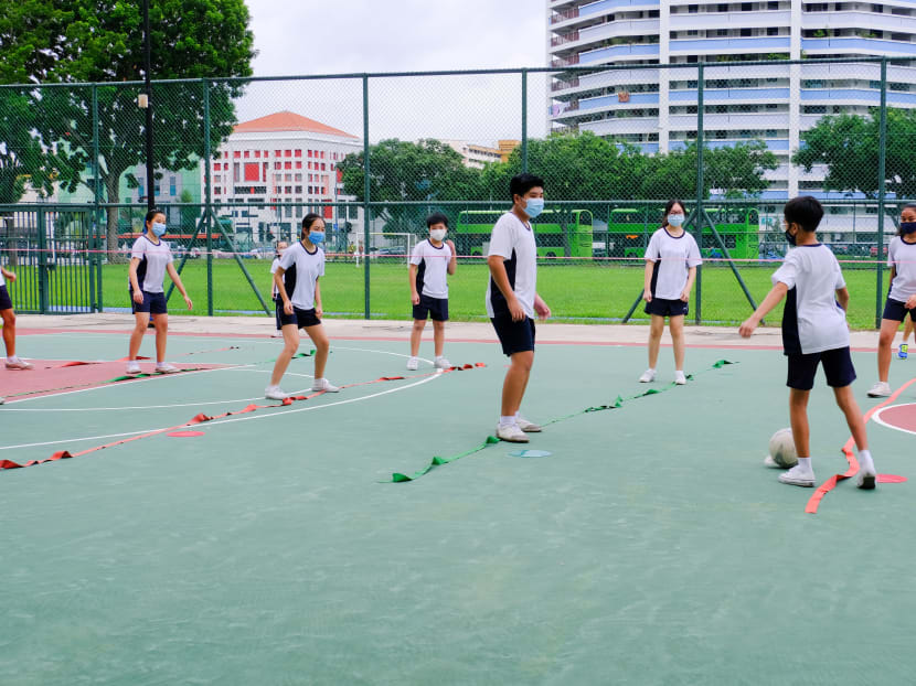 A physical education class being conducted at Ngee Ann Secondary School. The Ministry of Education said that schools will have the flexibility to decide when co-curricular activities will resume.