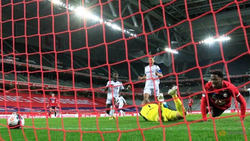 Last-gasp David strike earns Lille 2-1 win against Reims Last-gasp David strike earns Lille 2-1 win against Reims