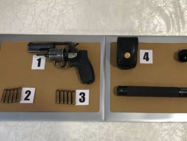 The police recovered a service revolver, ammunition and baton from the auxiliary police officer. 