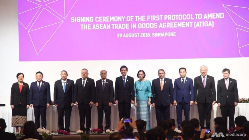 ASEAN economic ministers ink 2 agreements to remove barriers in goods and services trade ASEAN economic ministers ink 2 agreements to remove barriers in goods and services trade