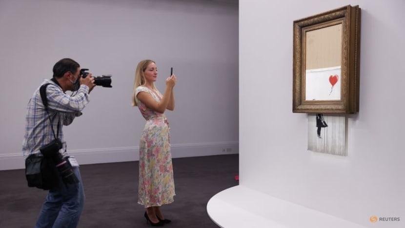 Three years on, shredded Banksy artwork returns to auction Three years on, shredded Banksy artwork returns to auction