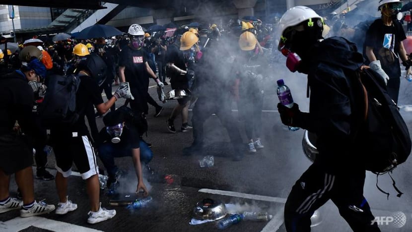 Hong Kong police fire tear gas, rubber bullets as strikes paralyse city Hong Kong police fire tear gas, rubber bullets as strikes paralyse city