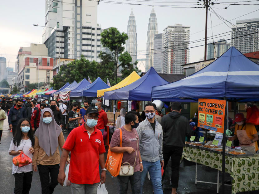 Muslims wearing protective masks shop for food before Iftar (breaking fast) at a Ramadan bazaar, amid the Covid-19 outbreak, in Kuala Lumpur, Malaysia on April 15, 2021.