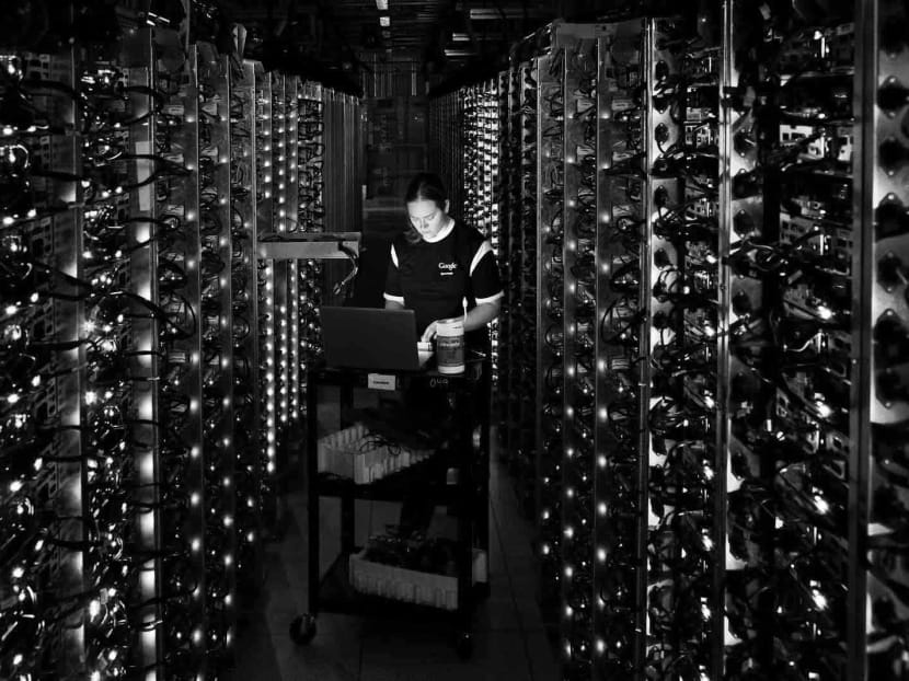 A technician working in a Google data centre in Oregon. Google, Facebook, Amazon and Baidu are buying up talent and investing to build in-house AI groups. Photo: AP