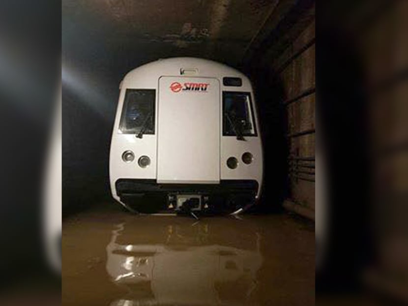 An SMRT train in a flooded MRT tunnel, in a photo widely circulated on social media. Rail operator SMRT has sacked eight employees – comprising one senior executive, two managers and five technical staff - following the conclusion of its internal investigation and disciplinary inquiry into the Oct 7 tunnel flooding incident.