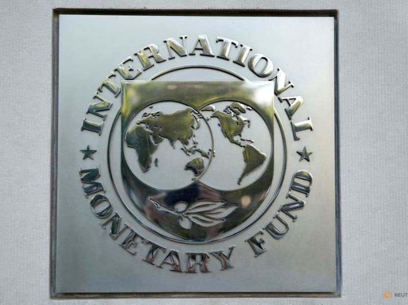 FILE PHOTO: The International Monetary Fund logo is seen at IMF headquarters in Washington, U.S., October 14, 2017. REUTERS/Yuri Gripas/File Photo