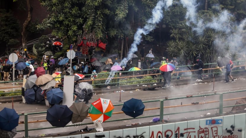 Choking and crying, Hong Kong protesters pinned back on campus Choking and crying, Hong Kong protesters pinned back on campus