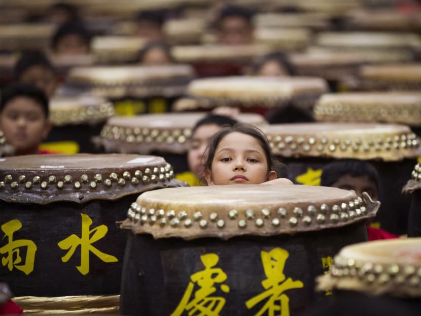 Drummers preparing before the performance of A Flourish of Hundreds Drums  in Kuala Lumpur, Malaysia, Sunday, Jan 8, 2017. The performance has broken the Malaysia Book of Record with 388 drummers perform 24 Festive Drums.  Photo: AP