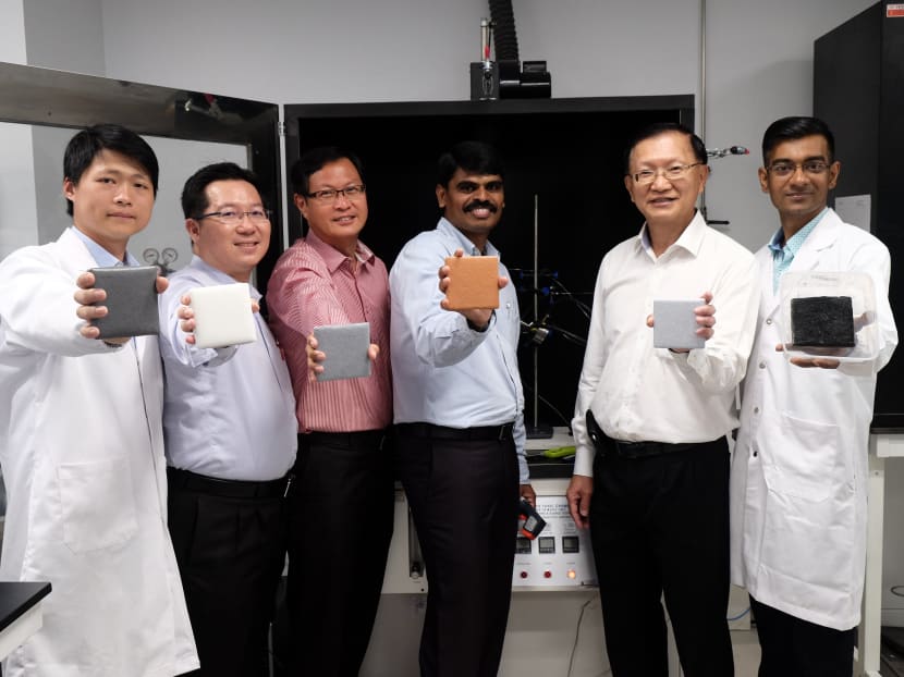 Assistant Professor Aravind Dasari (third from right) from NTU’s School of Materials Science and Engineering, who led the research team, said that the average fire-retardant coating forms a “charred layer” that acts as a protective layer against heat. It is usually “thick and foam-like” and tends to fall off easily, exposing steel structures to the fire. Photo: NTU