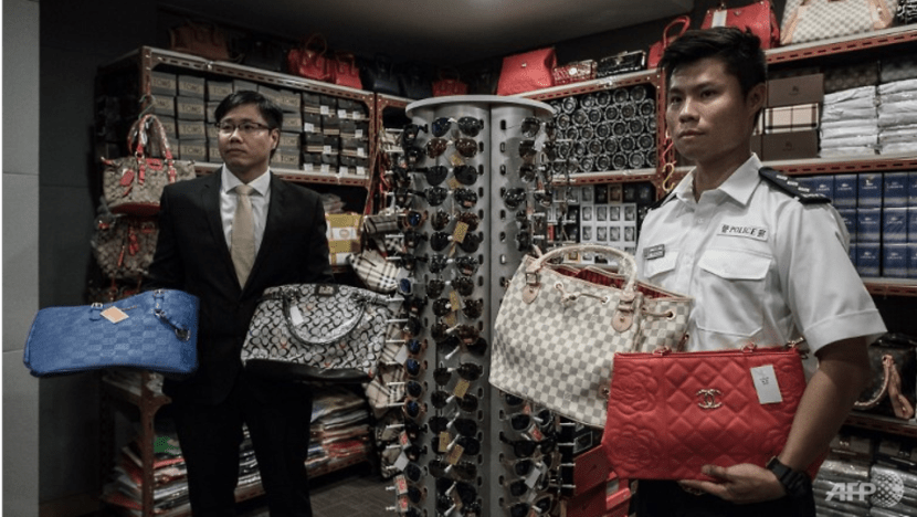 Commentary: Who on earth still buys counterfeit branded goods?
