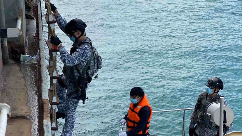 Navy personnel keep up inspection of foreign ships to secure Singapore waters despite COVID-19 risk Navy personnel keep up inspection of foreign ships to secure Singapore waters despite COVID-19 risk