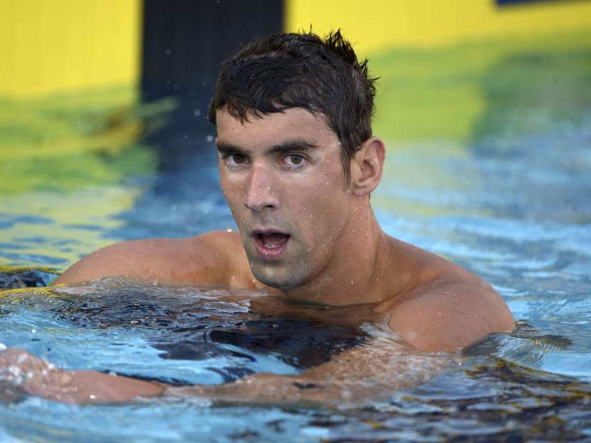Michael Phelps reacts after placing seventh in the 100m freestyle in the 2014 USA National Championships in Irvine, California, in this file photo taken Aug 6, 2014.  Photo: Reuters