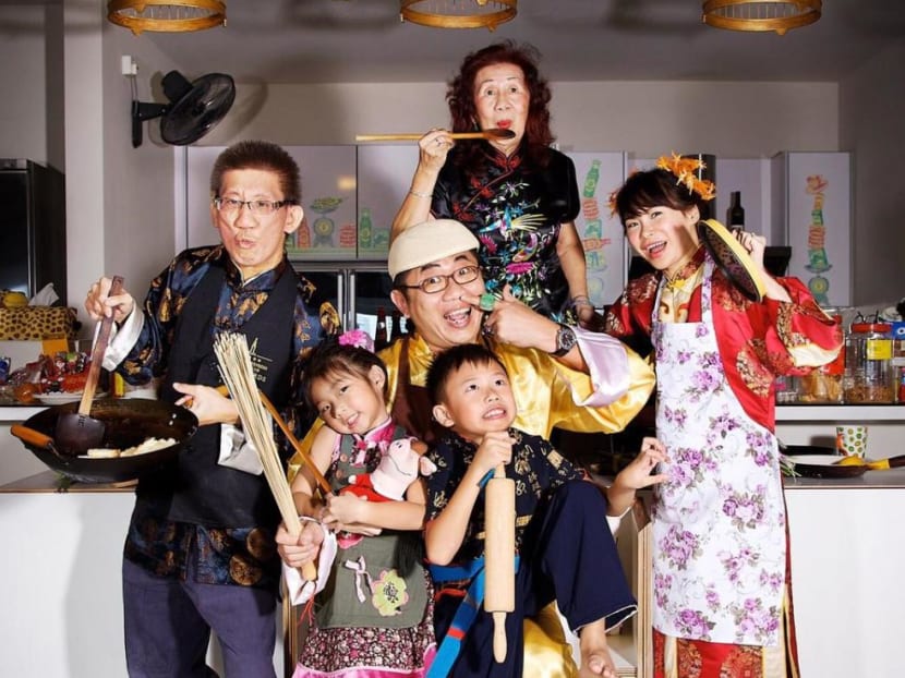 Mr Calvin Soh (centre) with his wife Arlette Tan-Soh (far right), their two children Ava and Dylan, Mr Soh's brother Adrian (far left) and mother Ng Swee Hiah (back row) during Chinese New Year in 2012&nbsp;— the year Mr Soh decided to change his parenting style.