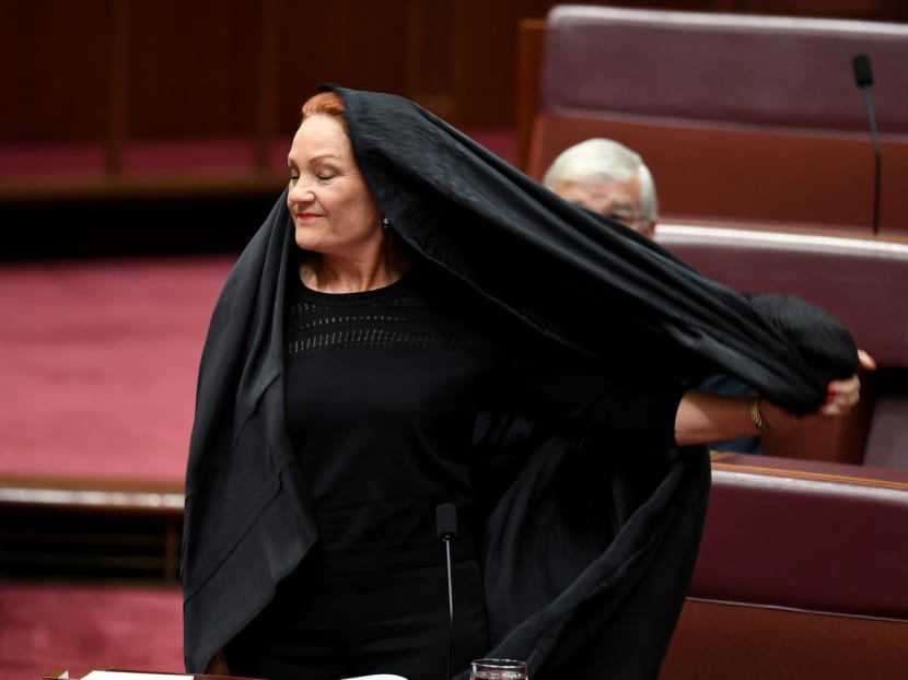 Pauline Hanson rebuked over Senate burqa stunt
