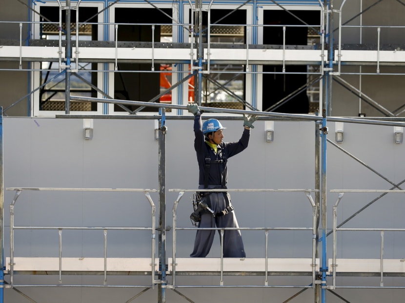 The use of automation has increased productivity at Japan’s construction sites by up to ten-fold, leaving human workers with a lighter load. Photo: Reuters