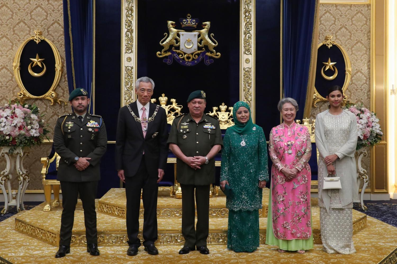 Prime Minister Lee Hsien Loong and Mdm Ho Ching at the Johore State Award Investiture Ceremony on May 6, 2022, with the Sultan of Johor, Sultan Ibrahim Ibni Almarhum Sultan Iskandar, and his wife, Raja Zarith Sofiah, the Johor crown prince Tunku Ismail Sultan Ibrahim and his wife Che’ Puan Besar Khaleeda.