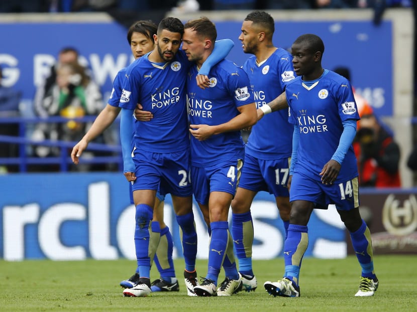 Riyad Mahrez celebrating with his team mates after scoring the first goal for Leicester against Swansea last week. Photo: Reuters