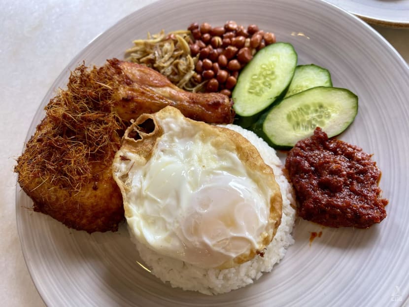 Nasi lemak with fried chicken 'berempah' in HDB kopitiam Nasi lemak with fried chicken 'berempah' in HDB kopitiam