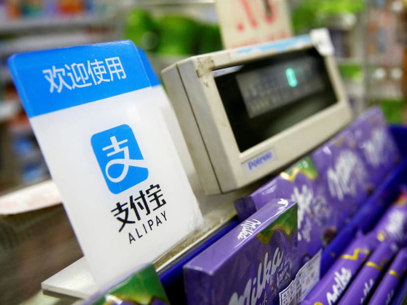 An Alipay logo is seen at a cashier in Shanghai.