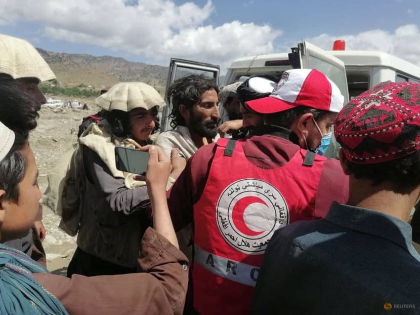 Afghan Red Crescent medics and volunteers transport earthquake victims to hospitals in Spera district, Khost province, Afghanistan, June 22, 2022.&nbsp;