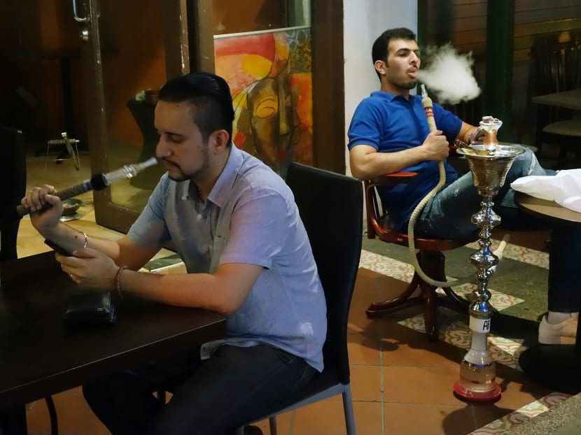 Owners of cafes in Kampong Glam offering shisha say they expect business to be affected by the ban, but by varying degrees. TODAY file photo