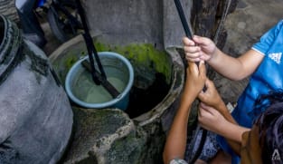Jakarta people are digging their own wells for water, but this makes the city sink faster