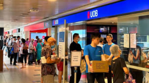 மோசடிகளைத் தடுக்கும் முயற்சியில் DBS, UOB வங்கிகள்
