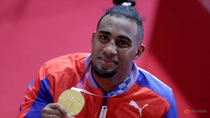 Olympics-Boxing-Lopez wins gold to put powerhouse Cuba in medals lead Olympics-Boxing-Lopez wins gold to put powerhouse Cuba in medals lead