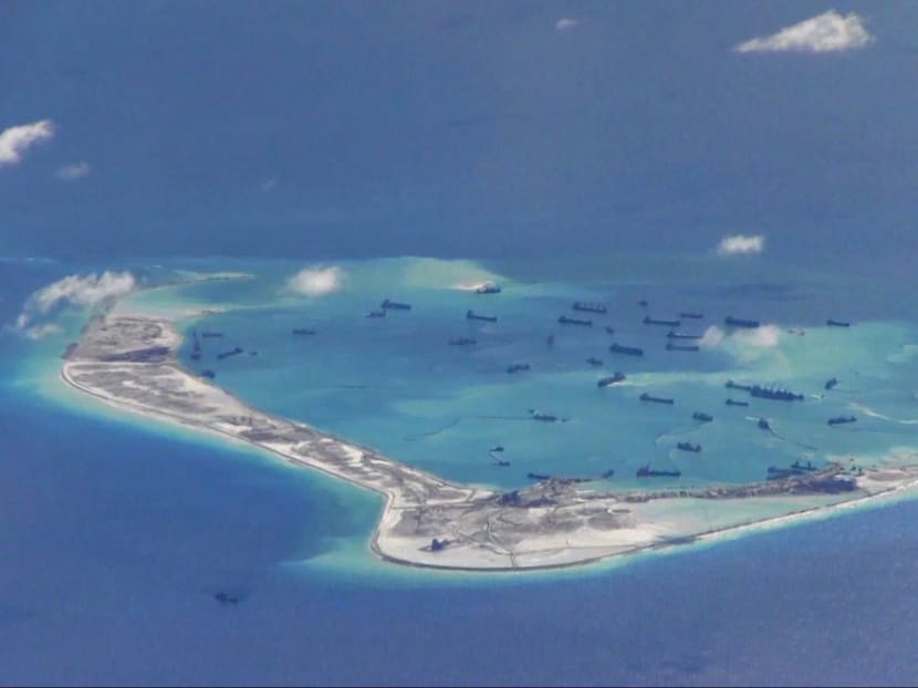 Chinese dredging vessels are purportedly seen in the waters around Mischief Reef in the disputed Spratly Islands in the South China Sea. Photo: Reuters