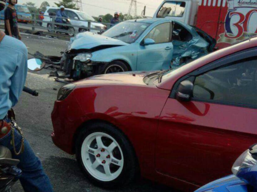 The badly damaged Proton Gen 2 following the crash. Photo: New Straits Times