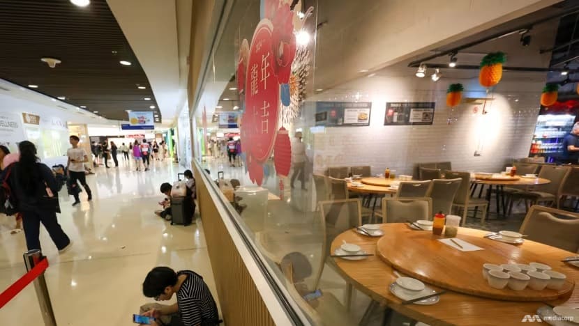 a near empty seafood restaurant in kallang wave mall march 8 2024