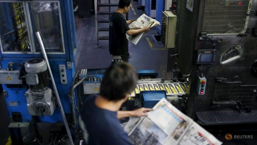 Apple Daily publisher halts shares after asset freeze by HK authorities