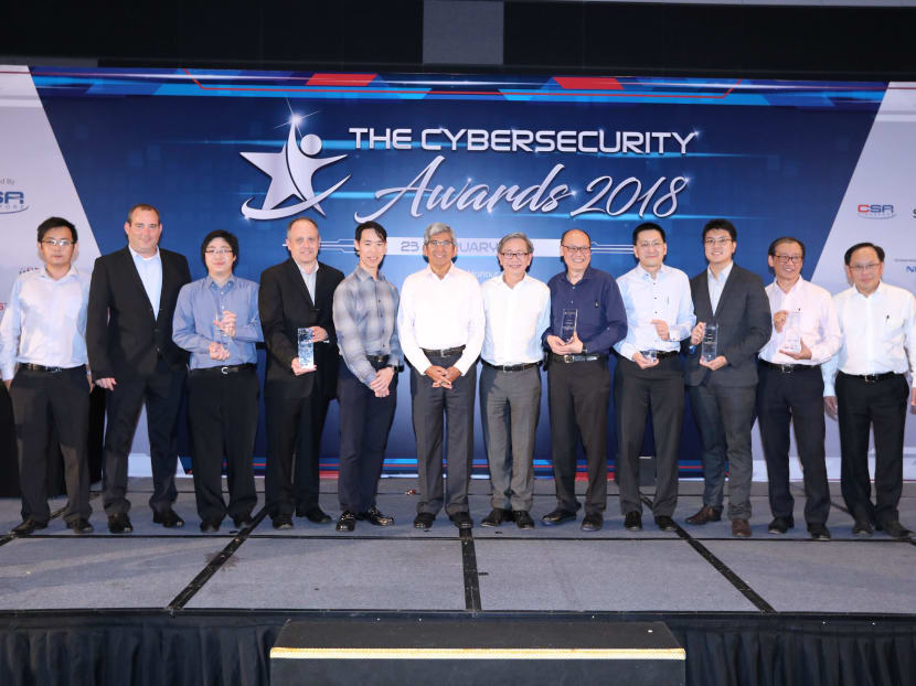 Professor Yu Chien Siang (fifth from right), adjunct professor at the National University of Singapore, was awarded the Hall of Fame Award at the inaugural Cybersecurity Awards and Gala Dinner on Friday (Feb 23) for his exceptional leadership, commitment and contributions to the cybersecurity ecosystem. Communications and Information Minister Yaacob Ibrahim (seventh from right) was the guest-of-honour at the event.